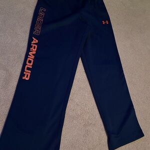 Under Armour Kids Dark Blue Joggers with Orange Logo